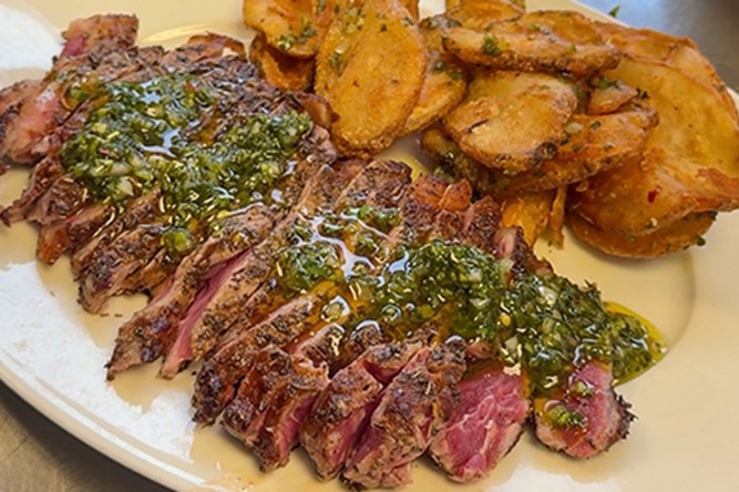 Steak “Frites” with Brew City<sup>®</sup> Potato Waves and Collard Green Chimichurri