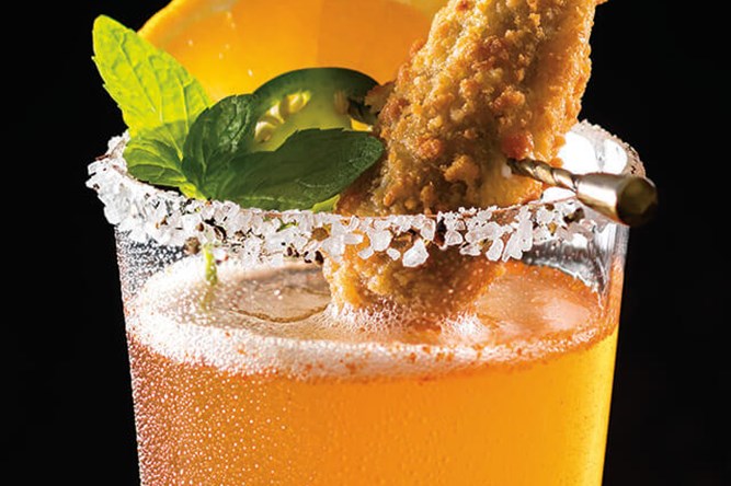 Michelada topped with a Jalapeno Popper