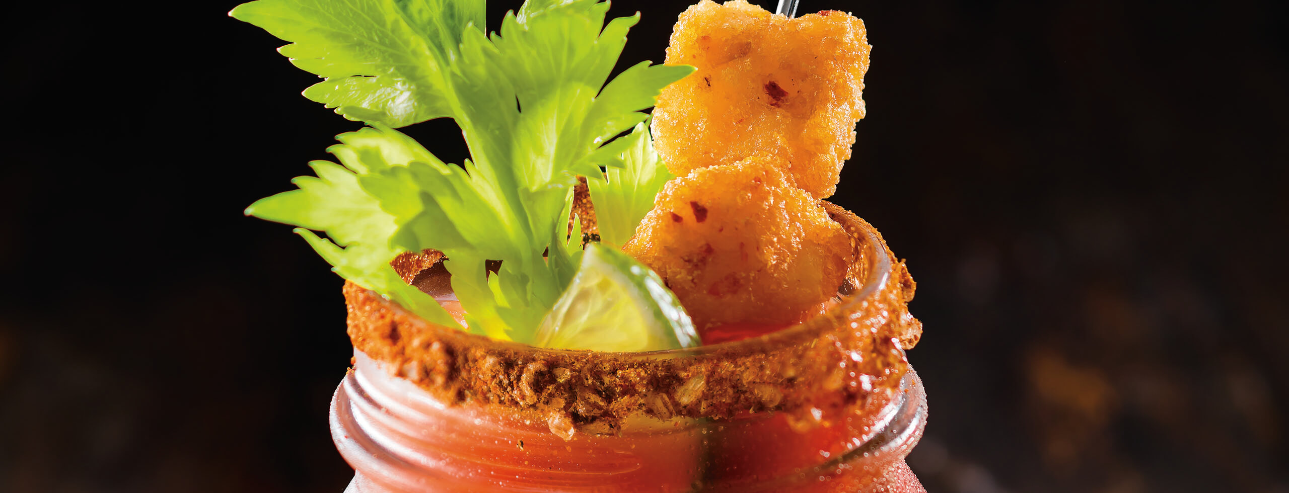 Caesar garnished with Chili Garlic Potato Bites